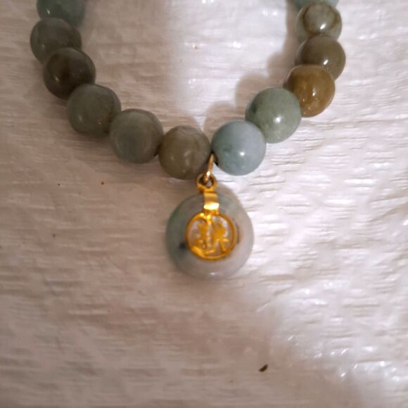 A Green Stone Stretchy Bracelet Good Luck Charm Thai Naga Eye Bead Tube - Picture 2 of 9